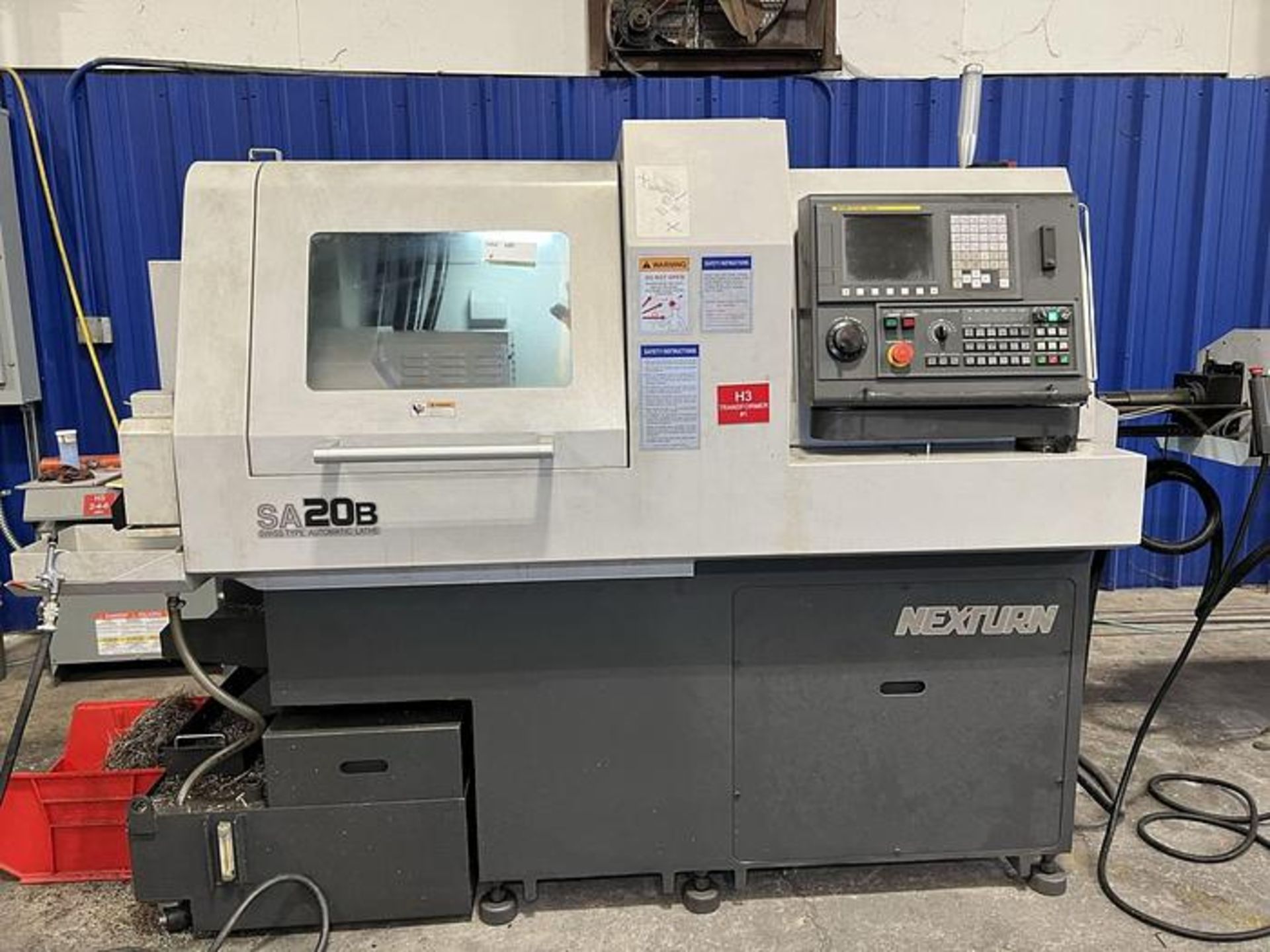 2020 NEXTURN SA 20B 7-Axis CNC Swiss Machine with Bar Feeder