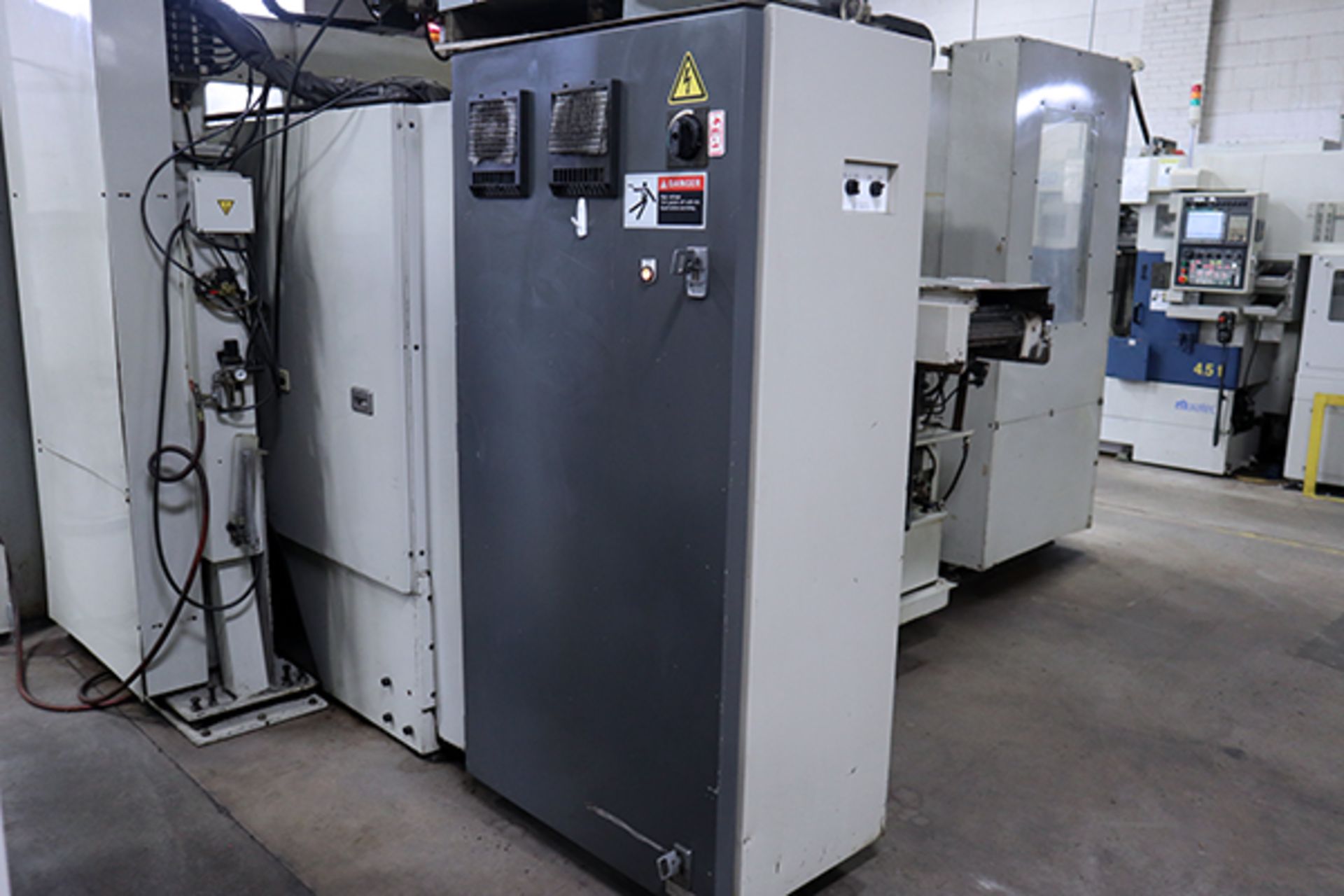 Kitako MT2-200W 4-Spindle CNC Horizontal Turning Center (2002) - Image 13 of 16