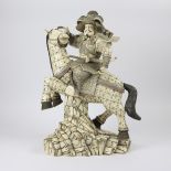 A bone statue of a samurai on his horse