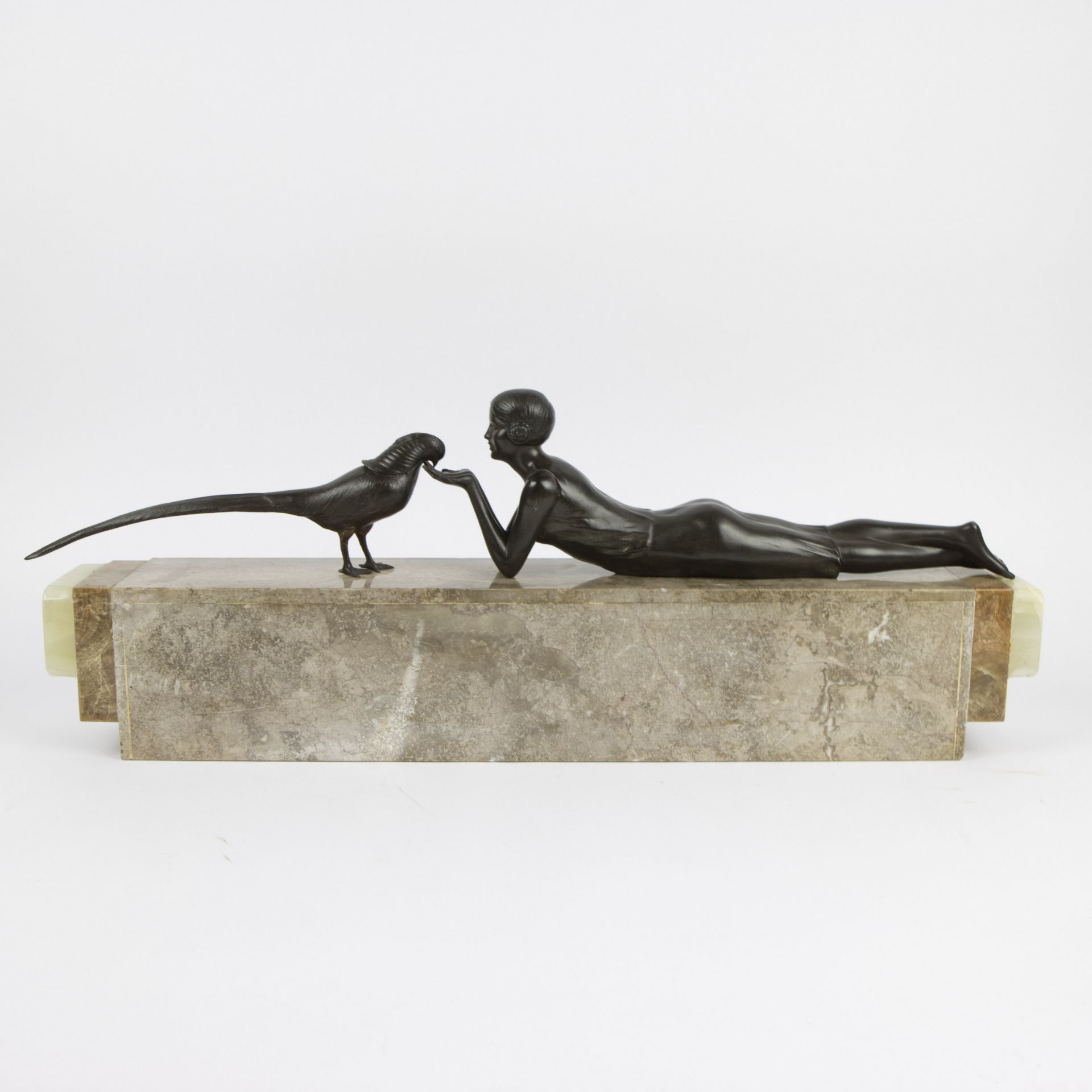 Art Deco sculpture reclining lady with bird