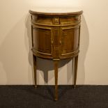 Crescent cabinet with bronze decorations and marble top