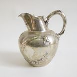 A silver German Art Nouveau jug