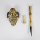 Etched animal skull, carved horn and horn bottle