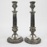 A pair of Empire silver candle sticks