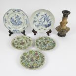 A collection of Chinese plates and statue in soapstone
