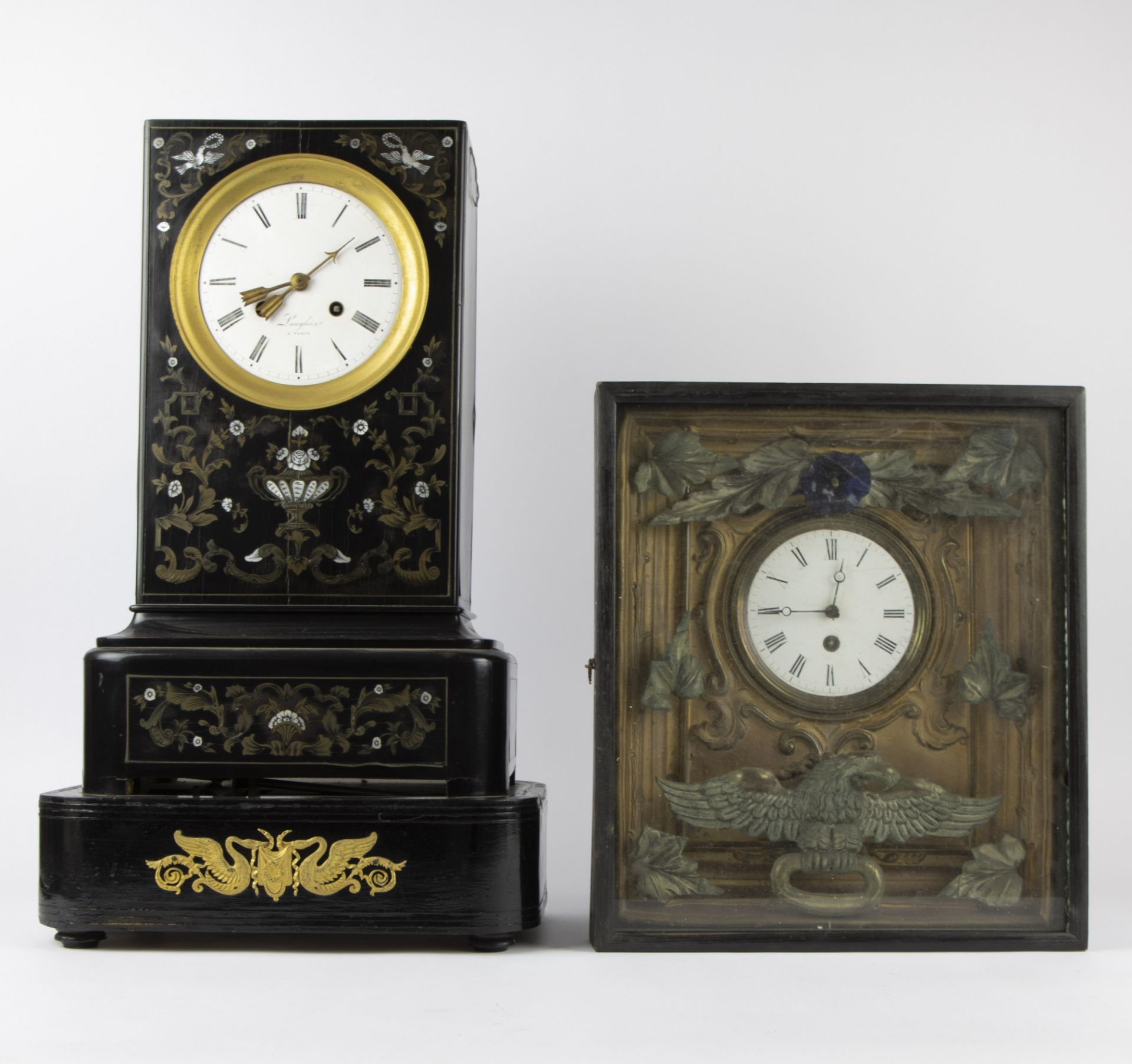 French Napoleon III table clock made of black lacquered wood, decorated with inlay Boulle technique