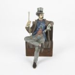 Viennese bronze Seated gentleman with chapeau buse 1st half 20th century