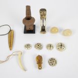 A collection of means of payment (5) and bone objects