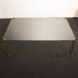 Vintage side table with glass top and bronze legs