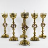 A collection of neo-gothic church candlesticks (6) in brass