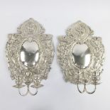 Couple silvered wall sconces