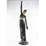 Large patinated metal Art Nouveau statue of on elegant lady, signed Steiner