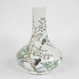 Chinese vase decorated with flowers and birds.