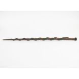 Antique wooden walking stick twisted with a snake