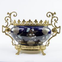 A BFK jardinière in cobalt blue porcelain with a hand-painted floral decor with gilded brass frame a