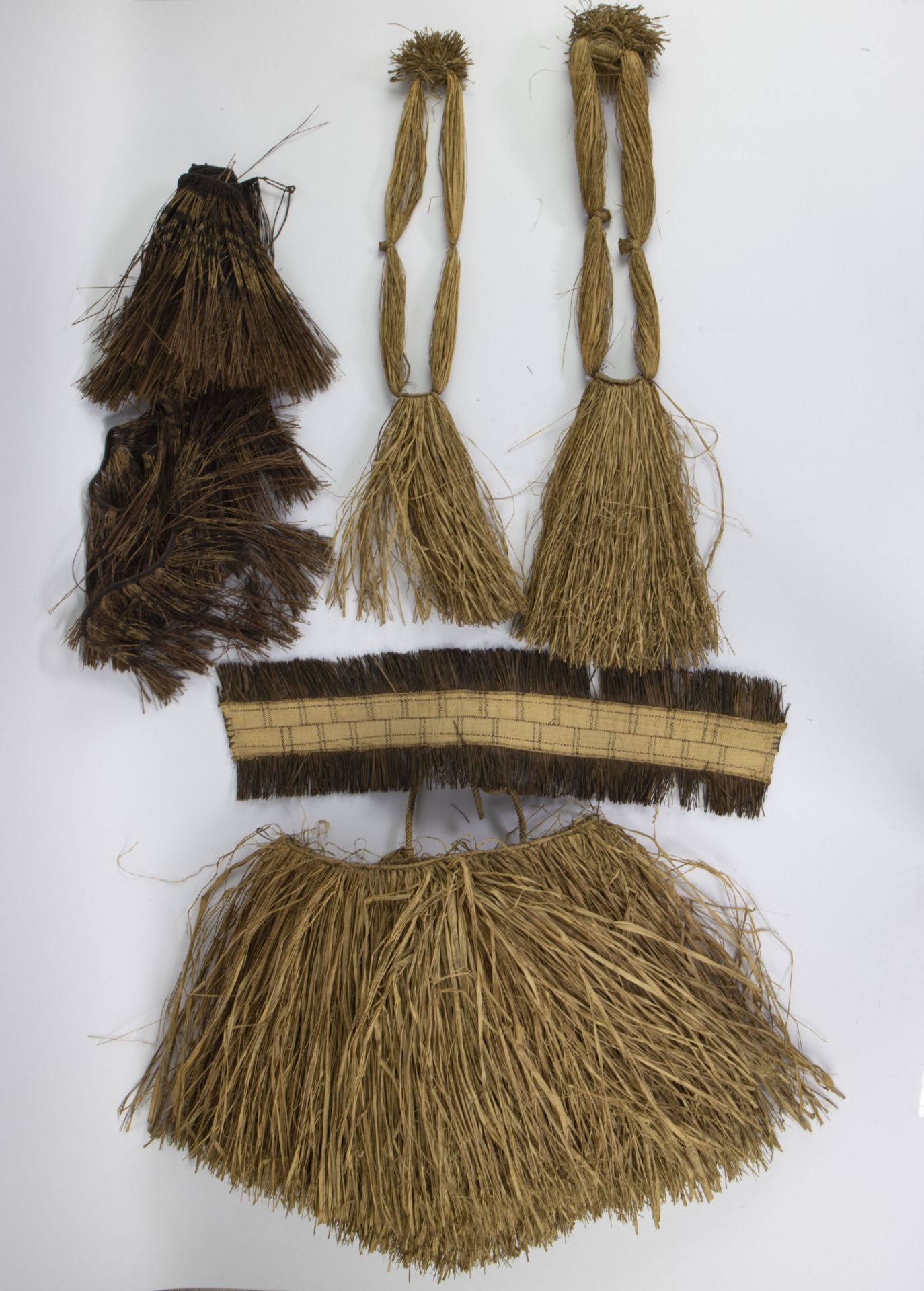 Native costume and ceremonial attire in raphia