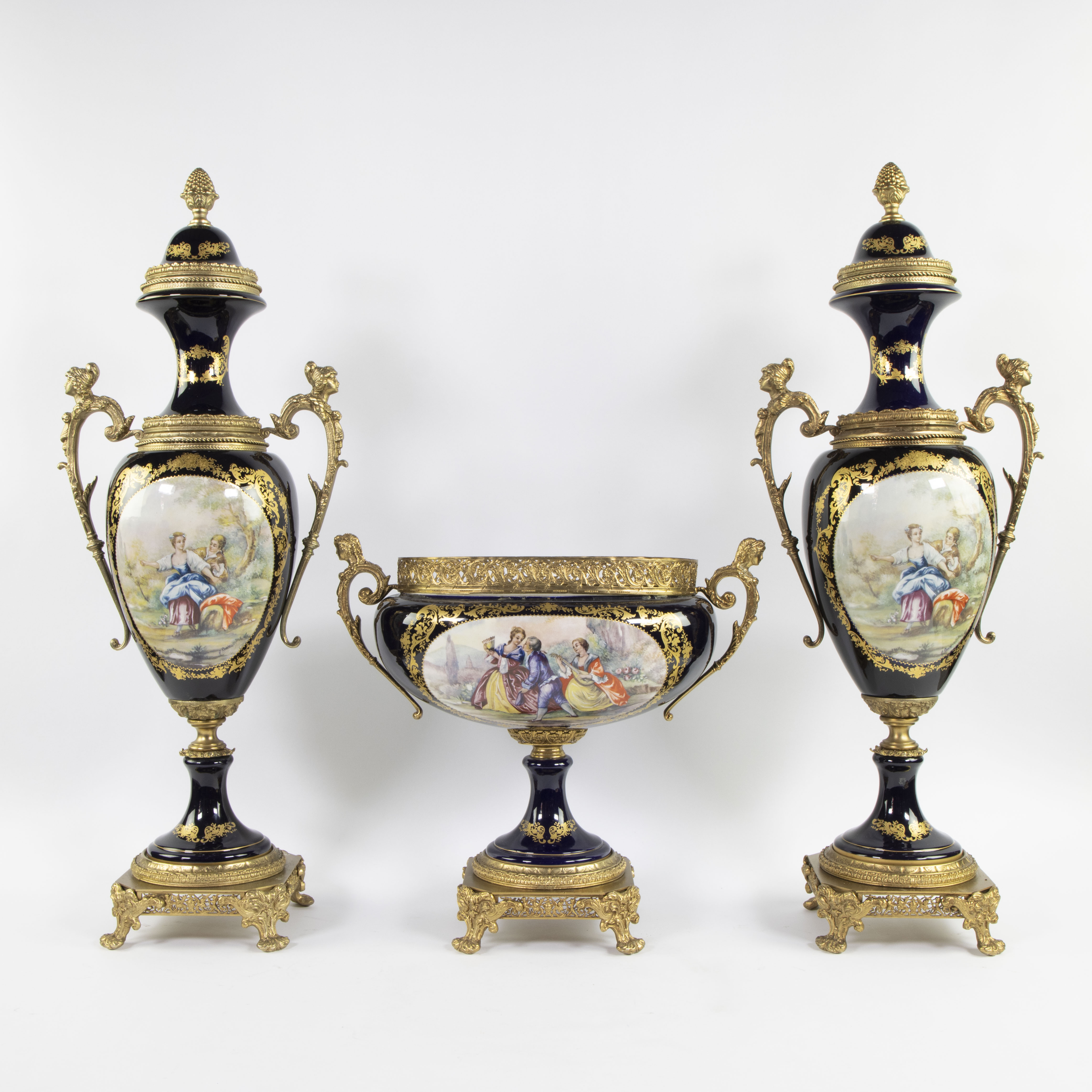 A Three-Piece Limoges garniture set, roundels signed A. Renzi.