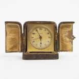 Zenith gilt brass travel clock in case circa 1900