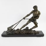 Fisherman with net, patinated bronze on black marble base, Art Deco, 20th century.