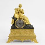 Antique French Charles X pendulum clock in fire gilt bronze.