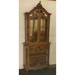 Liège oak display cabinet with rich carving
