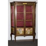 An ormolu-mounted display cabinet with marble top in the French Louis XV manner