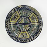 Persian glazed earthenware dish with geometric motifs 18/19th century