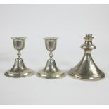 Oriental candlesticks (content 800) and 19th century lamp base (marked UK), weight 610 grams