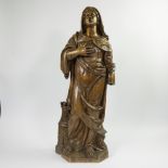 Saint Barbara with tower at feet, in walnut, Spanish, 18th century