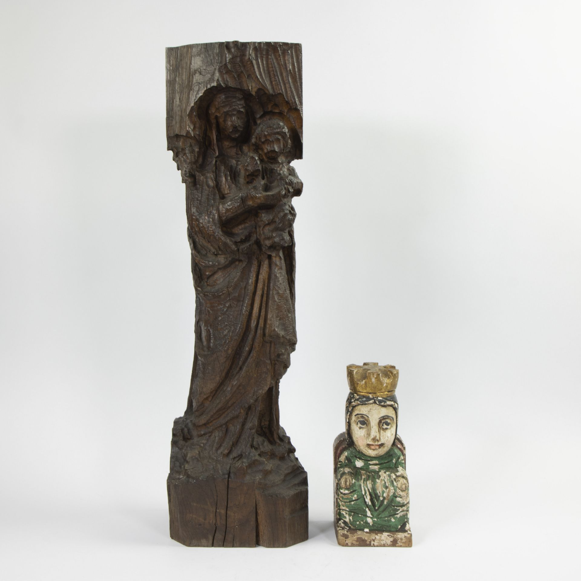 Collection of decorative folk statue and madonna with child