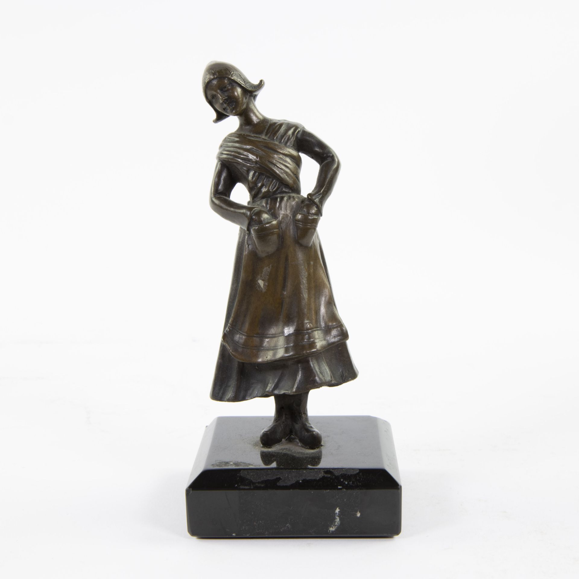 Dutch cheese girl, bronze on marble base