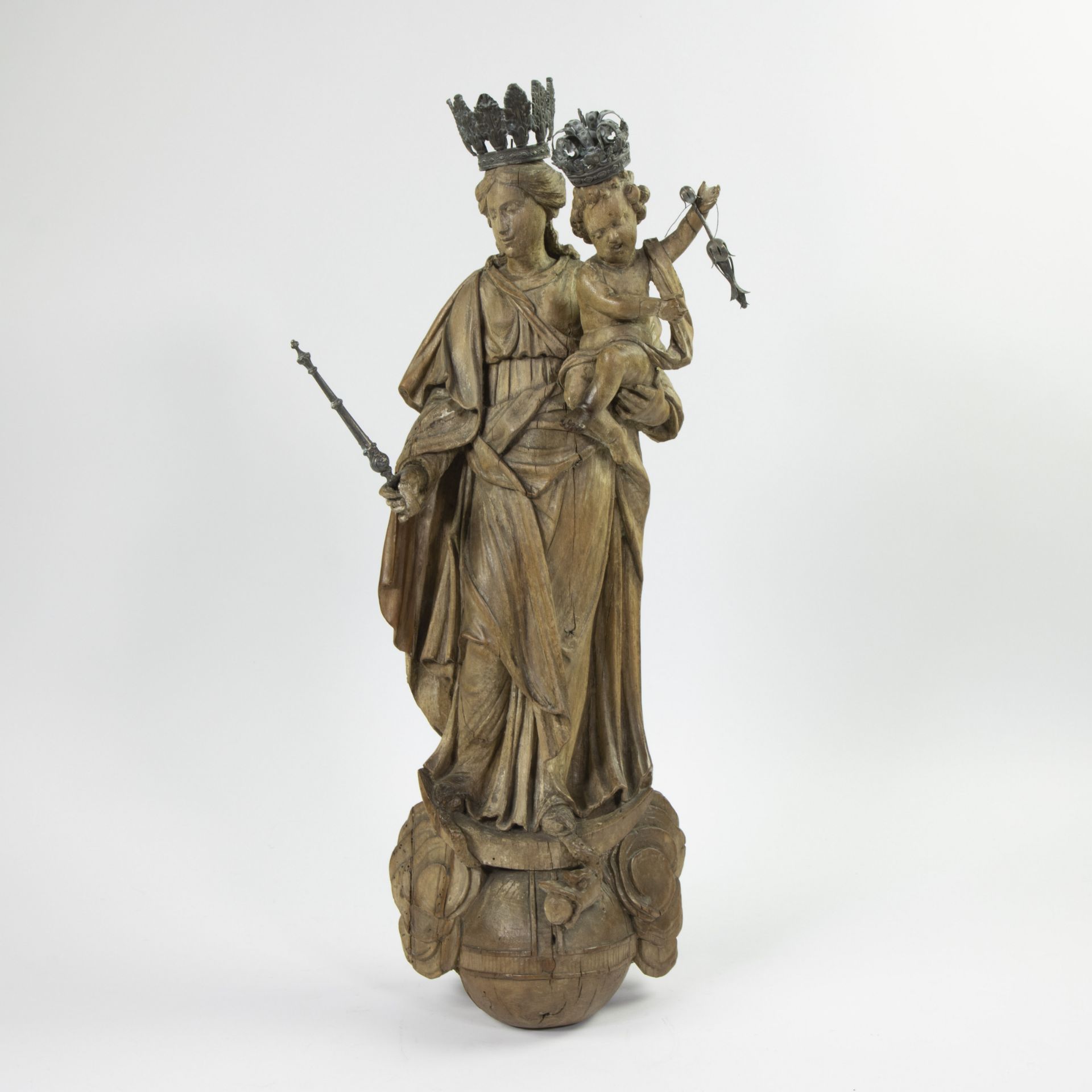 Madonna and child on globe and crescent moon, oak wood, 18th century, traces of polychromy