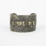 Silver bracelet treated with gold leaf and decor of Moai of the Easter Islands
