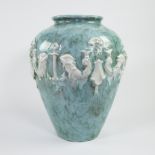 Heavy light blue glazed ceramic vase with mythical creatures