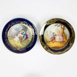 Pair of Sèvres plates with romantic scenes, hand painted and marked