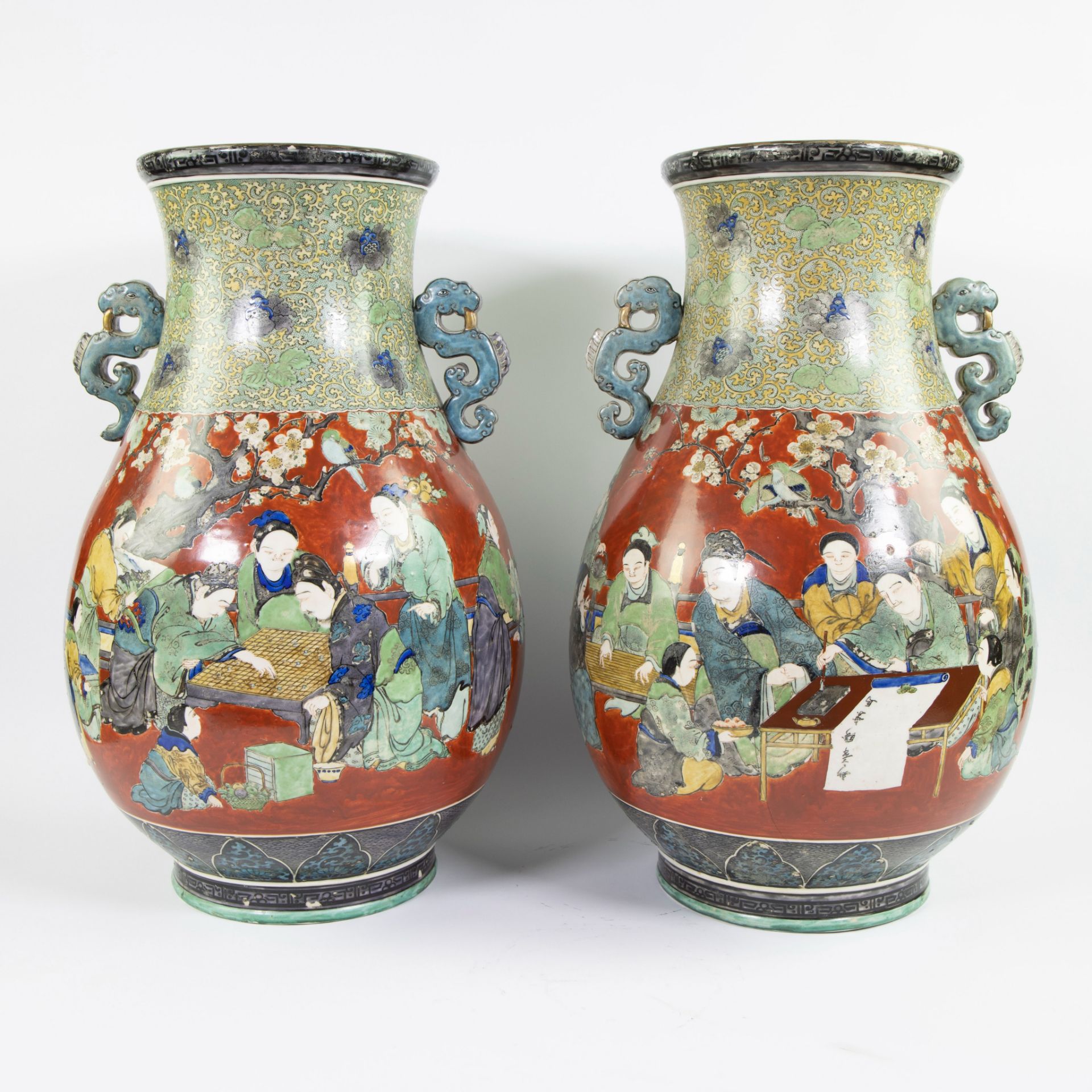 Pair of Japanese Kutani baluster vases with decor school scenes, Meiji period