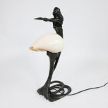 Art Deco bronze table lamp, in the shape of an elegant lady with a shell-shape shade