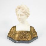 Alabaster bust of a young girl in gilded bronze, not signed