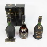 bottles of Cognac Napoleon and Reau