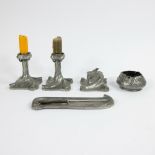 A collection of Art Nouveau pewter candlesticks, inkwell, jar and pen tray Schreuder & Olsson, Stock