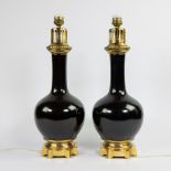 Pair lampadaires in black glazed faience and bronze base