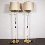 Vintage pair of floor lamps in goldgilded brass and plexi