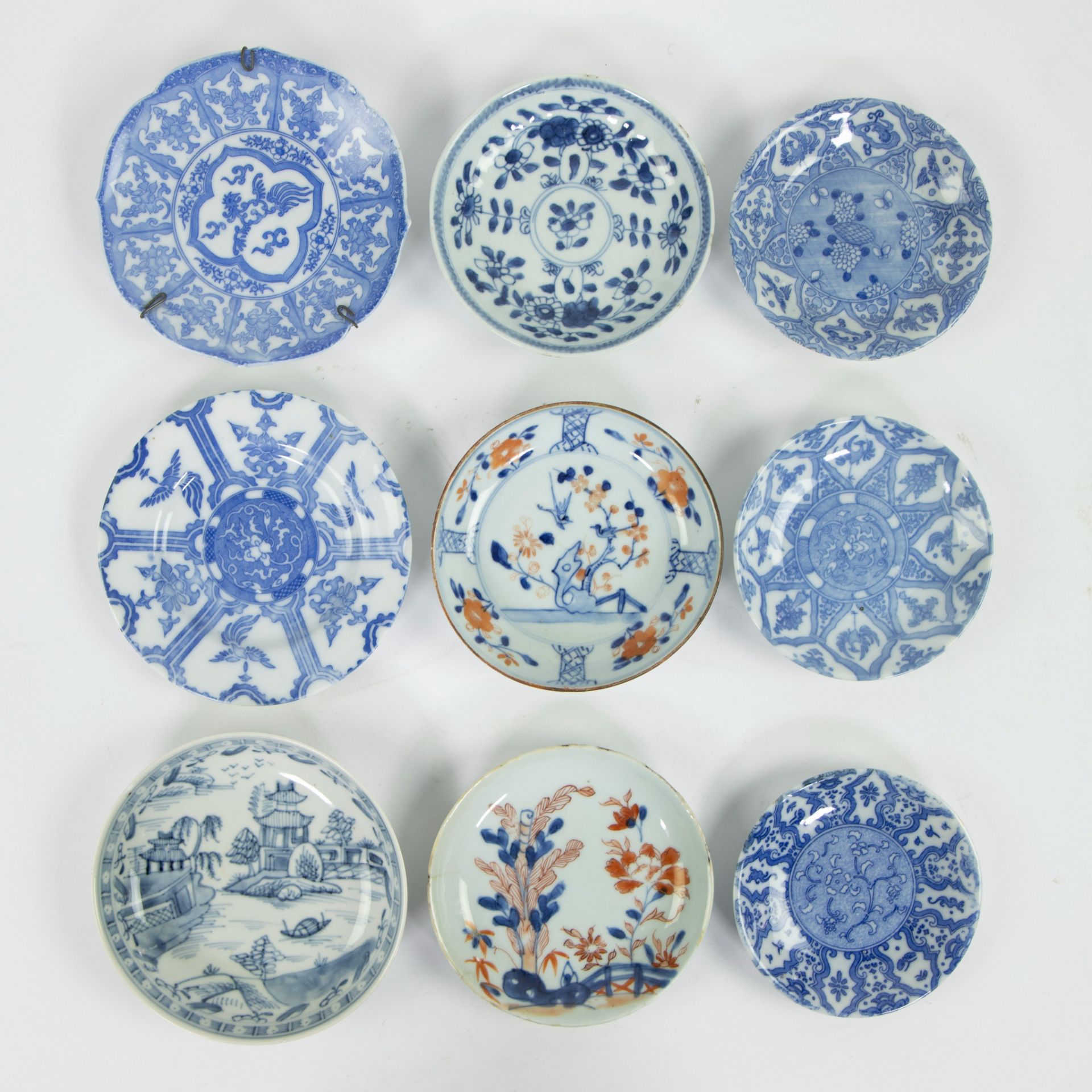 A collection of 15 Chinese saucers blue/white an Imari - Image 4 of 5