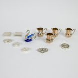 A collection of snuff and pill boxes, 4 silver jugs and salt cellar with blue glass