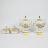 A collection of Hutschenreuter porcelain, 2 lidded vases and 2 finely gilded lidded boxes