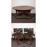 Antique oak oval table with 6 castle chairs