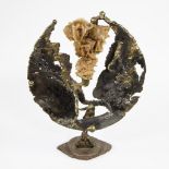 Bronze sculpture with desert rose, monogram.