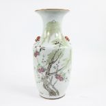 Chinese baluster vase decorated with birds and butterflies under a flowering tree, period republic