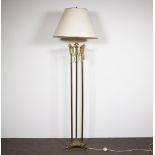 Vintage brass floor lamp decorated with lion heads