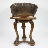 An Venetian 'Grotto' piano chair with scallop shell seat in walnut, 19th century